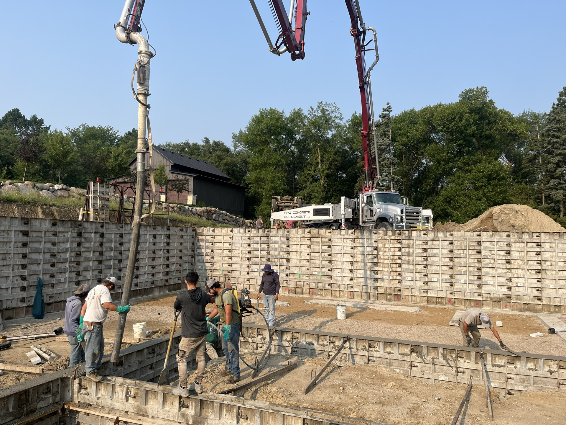 Concrete placement at a residential foundation project